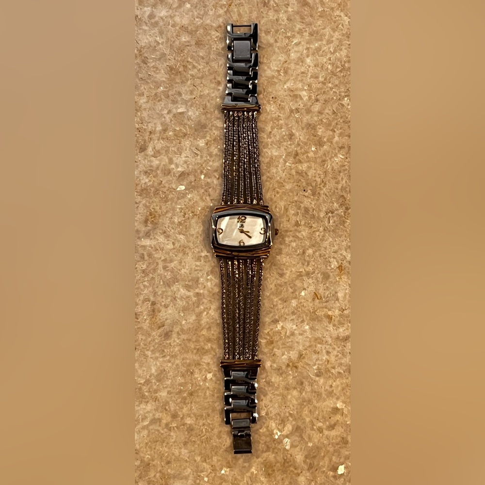 Ladies Watch. JS Watch Co. Silver and gold tone. 8” diameter.